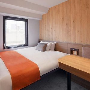 Kamer met een Queen Size Bed